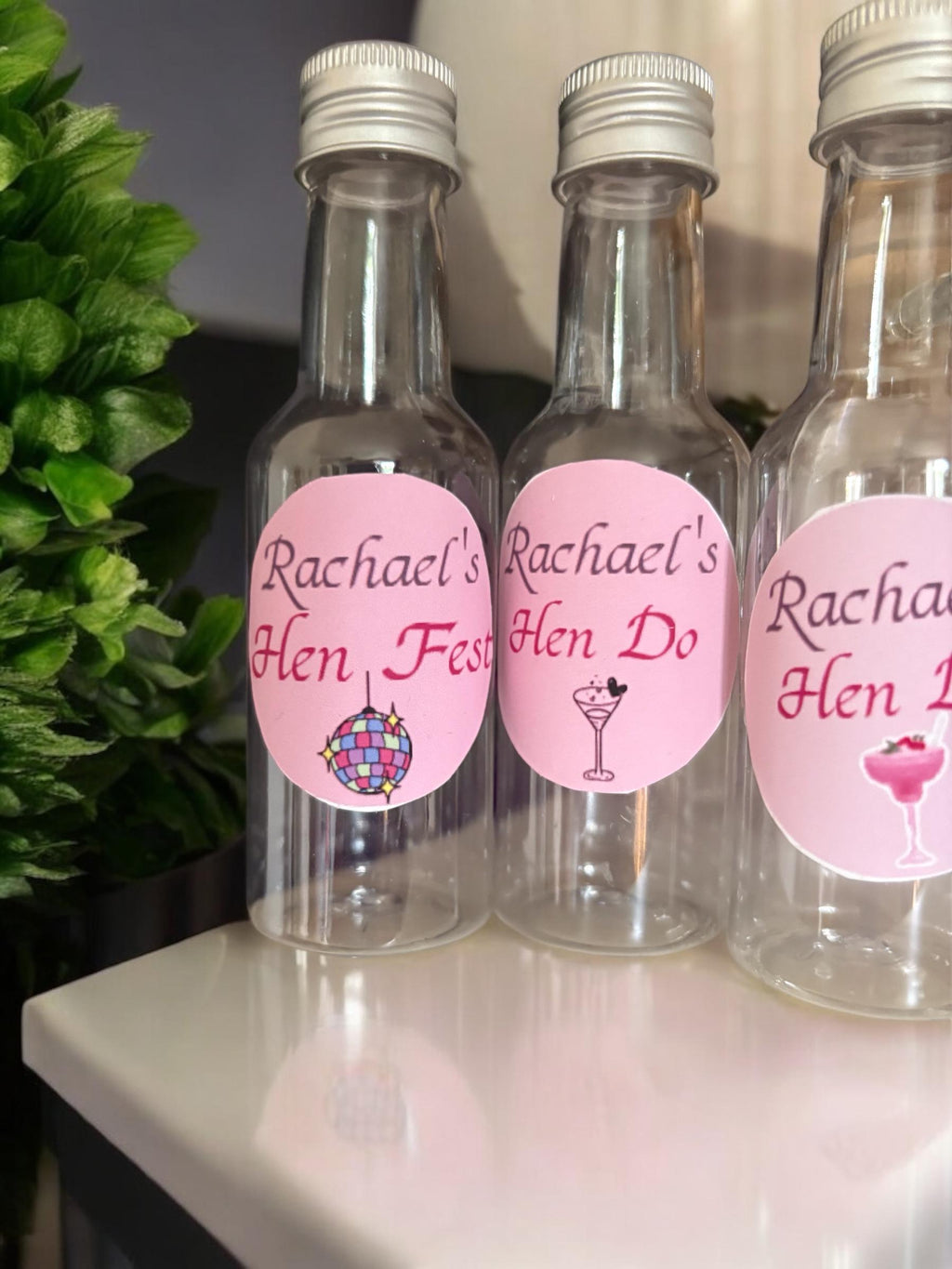 Hen do favour shot bottle - personalised stickers attached to suit celebration