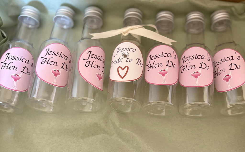 Hen do favour shot bottle - personalised stickers attached to suit celebration